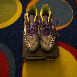adidas kids F50 Soccer Cleats in Purple and Lime